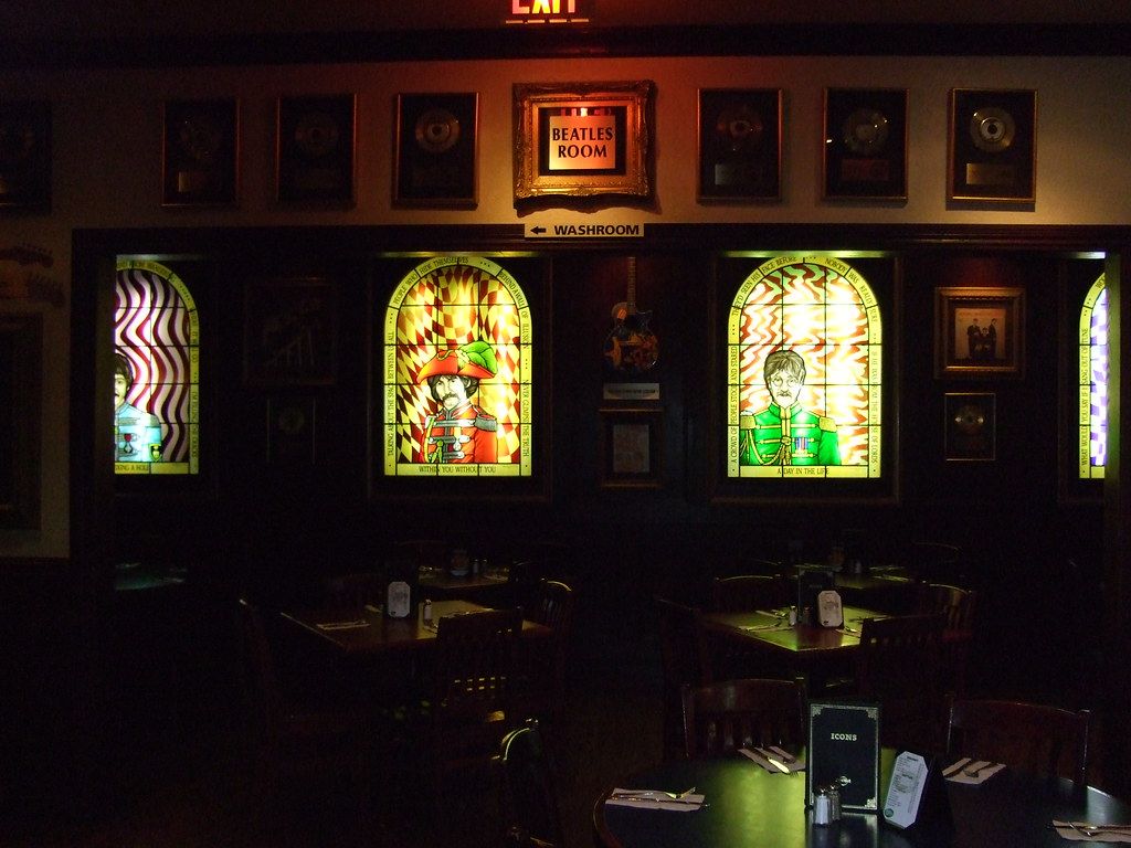 Three versions of the same café homepage using stock photographs, AI-generated pictures and photographs of one real café.